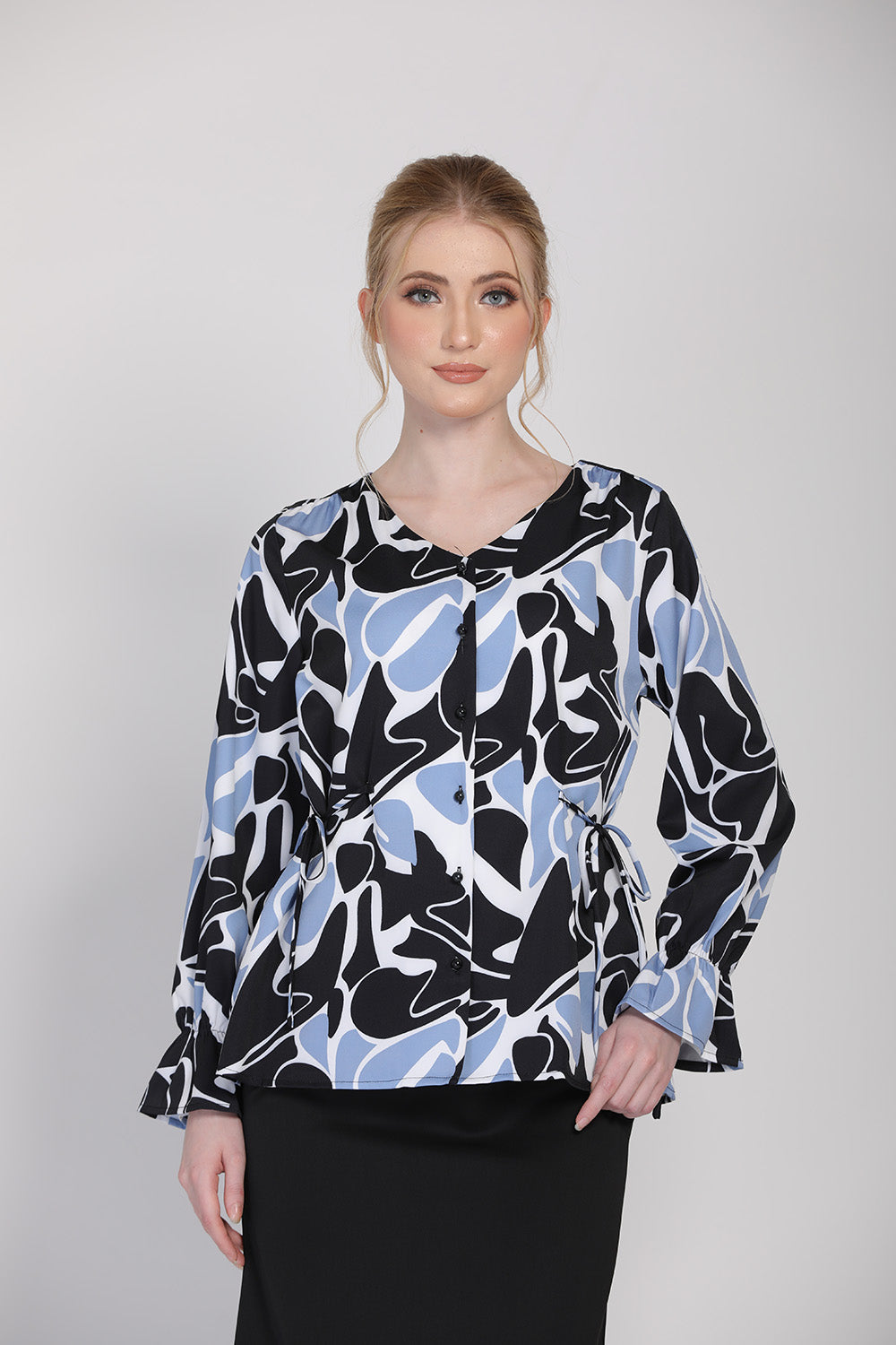 The Ceria Women Abstract Print Blouse